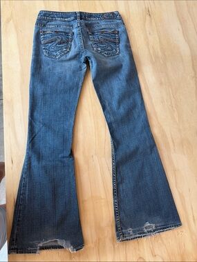 Silver Jeans Distressed Flare Jeans - Blue